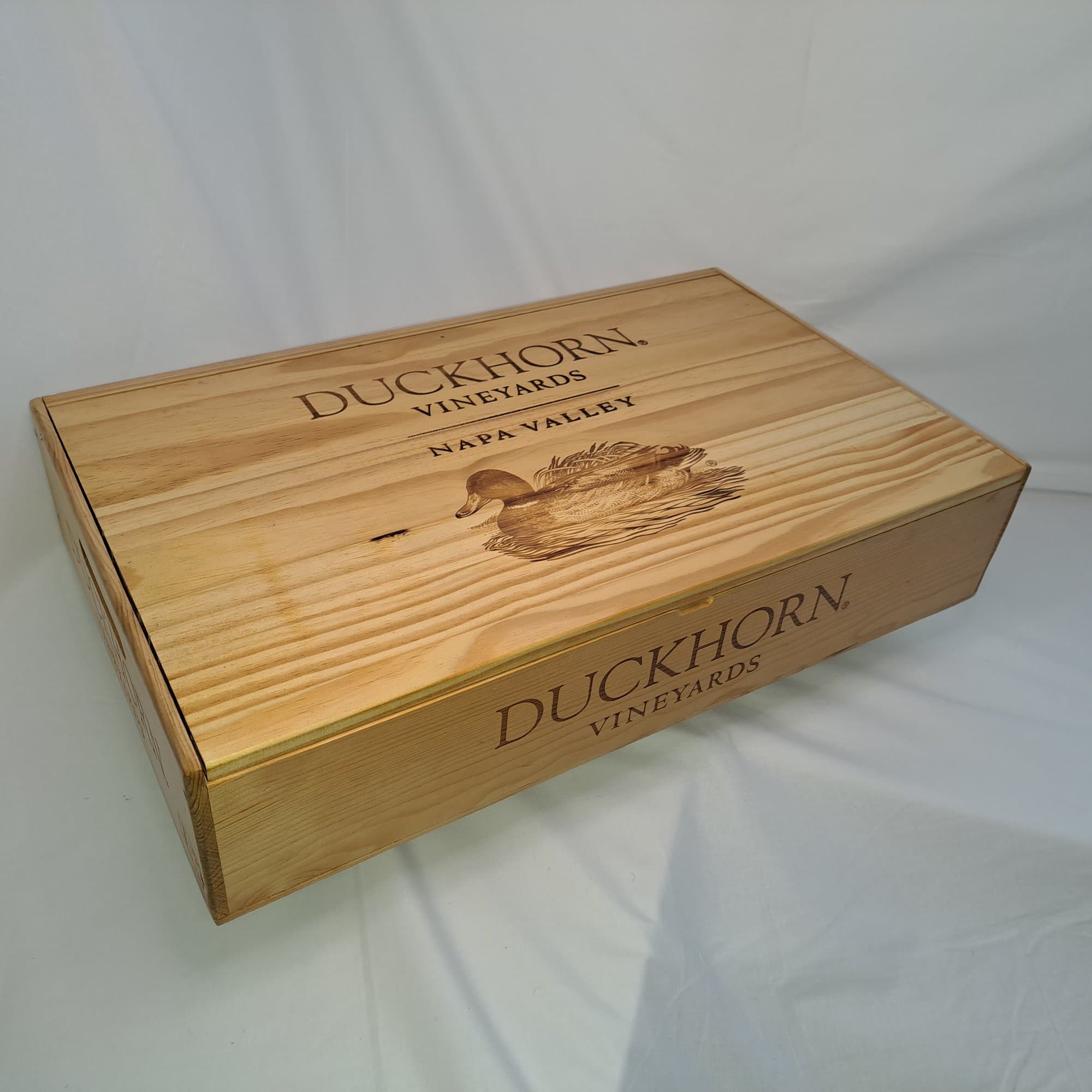 The Duckhorn wine box closed, looking like a plain branded wine box